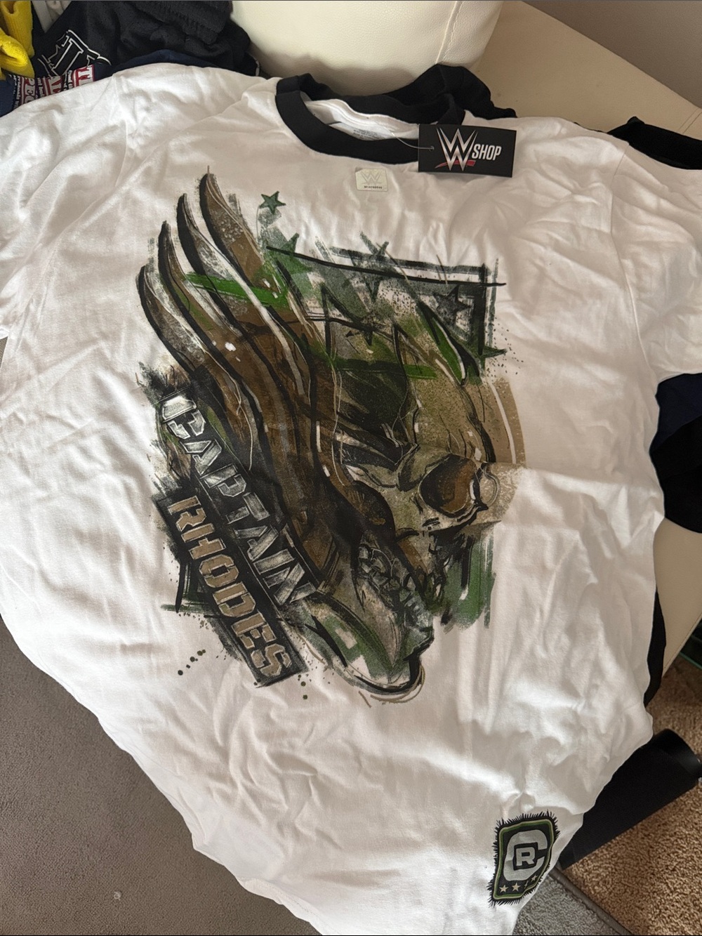 WWE Captain Rhodes White Graphic Tee with Green, Brown and Black Artwork
